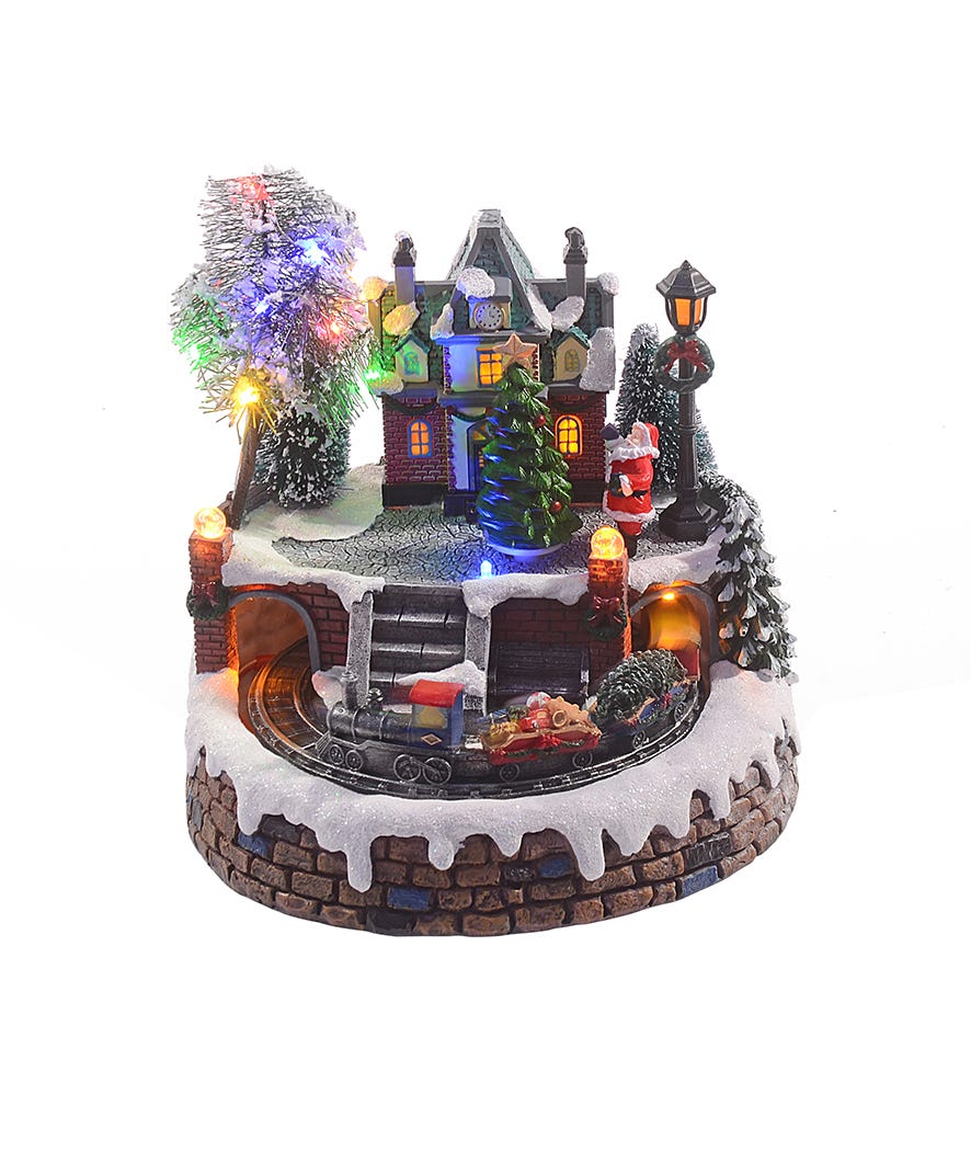 Paesaggio treno d'inverno con luci led multicolor